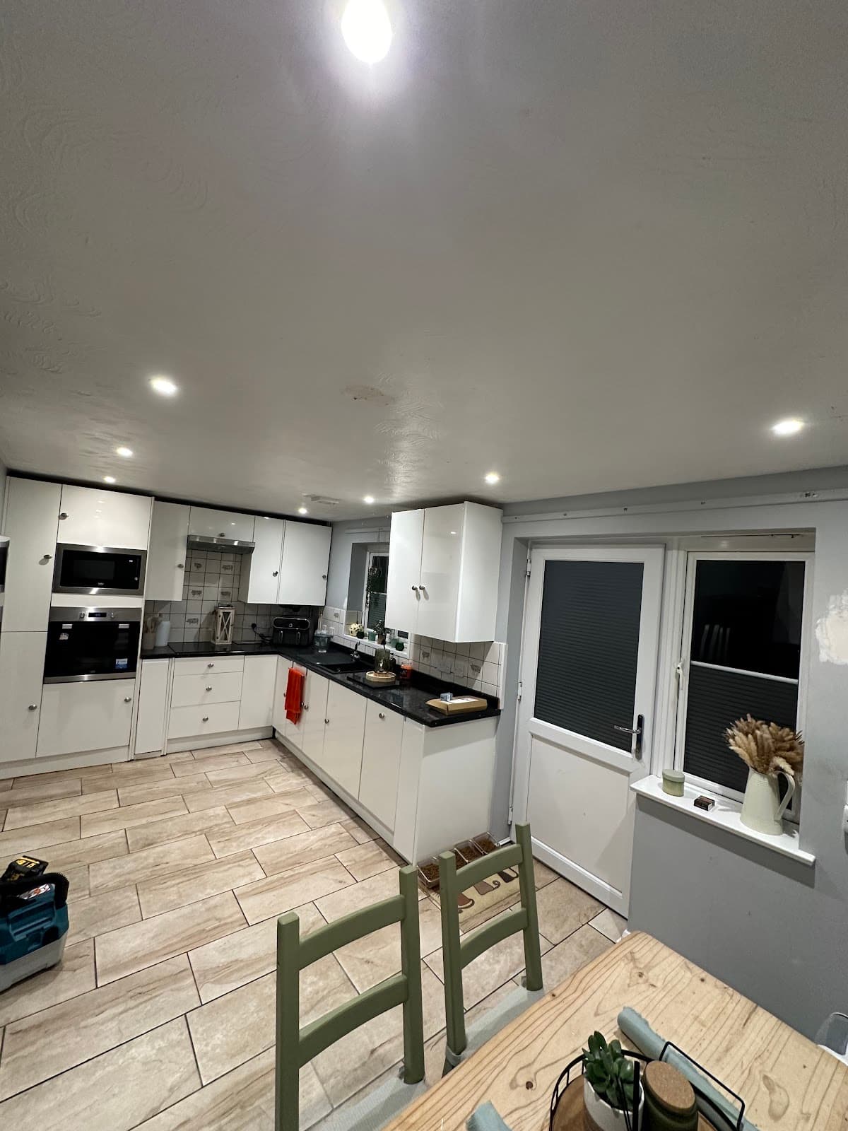 Recessed downlights fitted throughout a modern kitchen